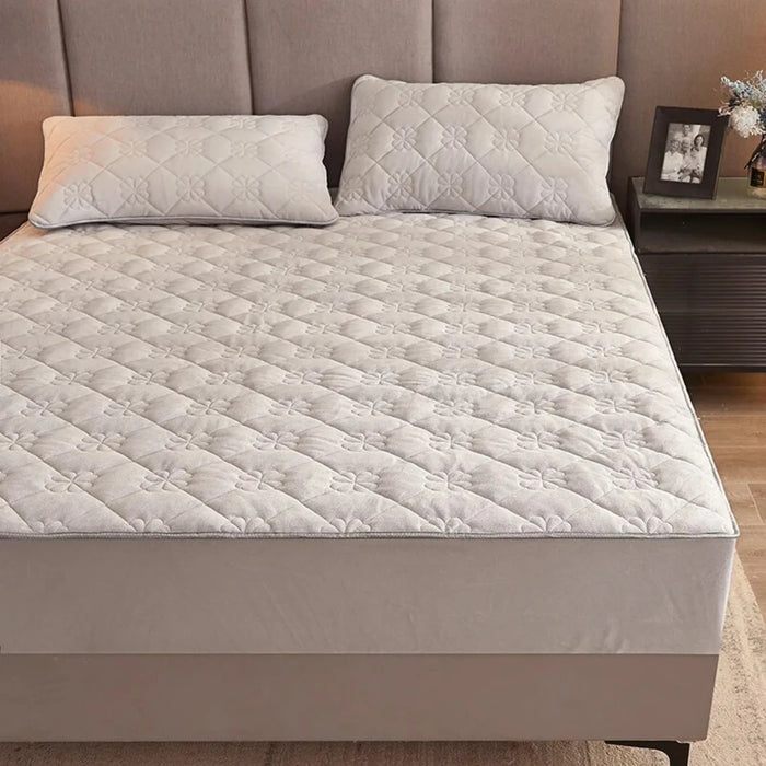 Luxurious and opulent ultimate thickened cotton mattress cover providing unmatched comfort and durability. Soft, cozy anti-slip