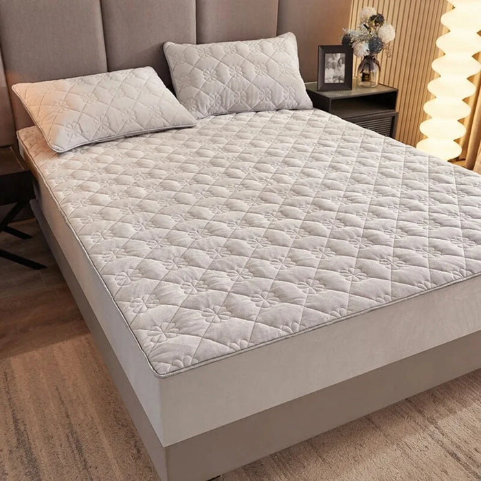 Luxurious and opulent ultimate thickened cotton mattress cover providing unmatched comfort and durability. Soft, cozy anti-slip